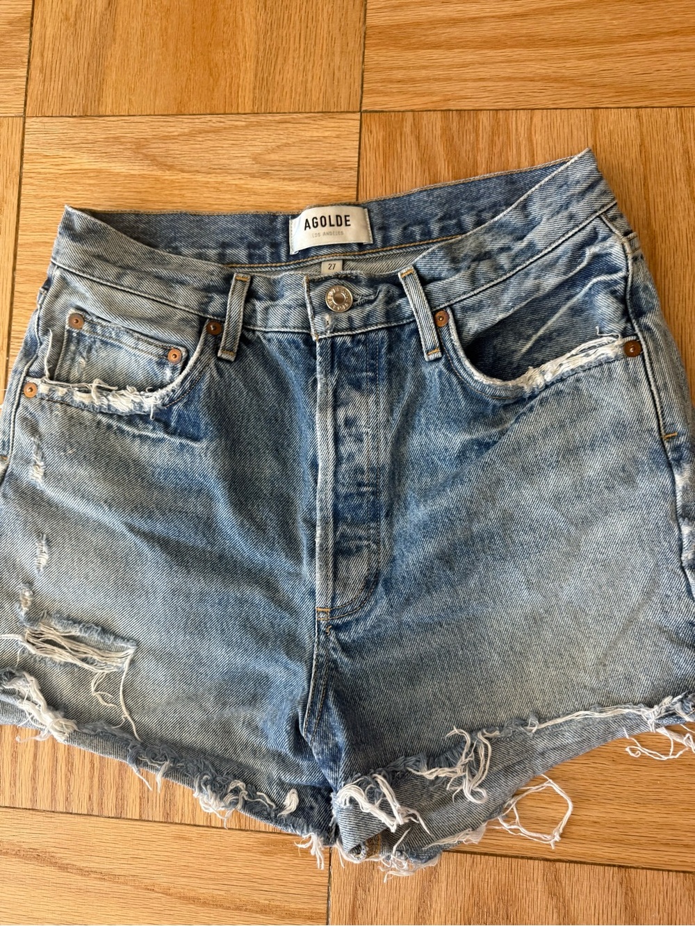Agolde Light Blue Distressed Denim Cutoff Shorts